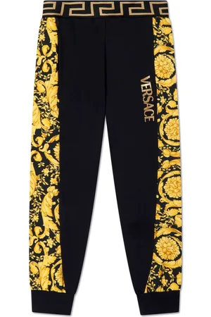 VERSACE Pantaloni sportivi con stampa Barocco