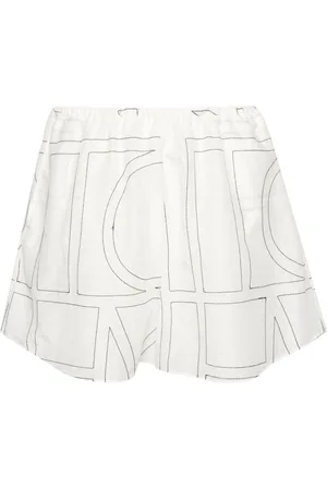 Totême Shorts con ricamo monogramma