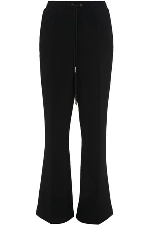 J.W.Anderson Pantaloni sportivi slim svasati