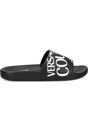 VERSACE Sandali slides con stampa