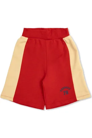 VERSACE Shorts bicolore con stampa