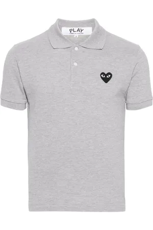 Comme des Garçons Polo con applicazione