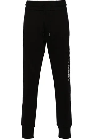 VERSACE Pantaloni sportivi con applicazione logo