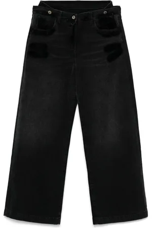 The Attico Jeans con design a strati
