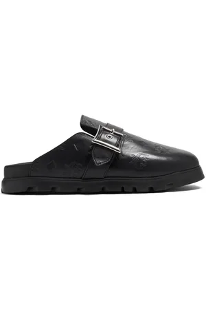 MCM Mules con monogramma