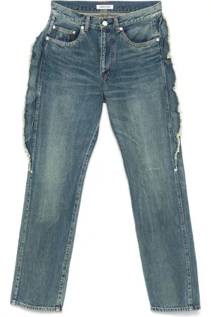 UNDERCOVER Jeans con frange