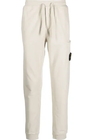 Stone Island Pantaloni sportivi con applicazione Compass