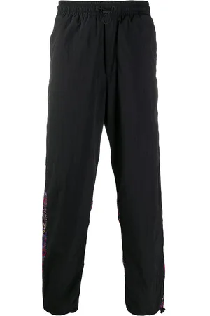VERSACE Pantaloni sportivi con stampa