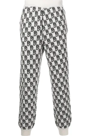 We11 Done Pantaloni sportivi con monogramma
