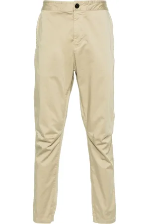 Stone Island Pantaloni affusolati con applicazione Compass
