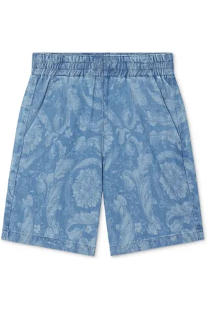 VERSACE Shorts denim con stampa Barocco