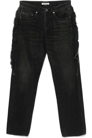 UNDERCOVER Jeans con frange