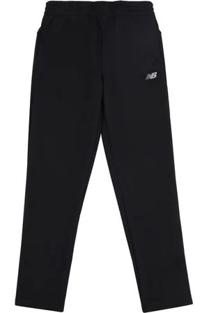 New Balance Pantaloni sportivi con stampa
