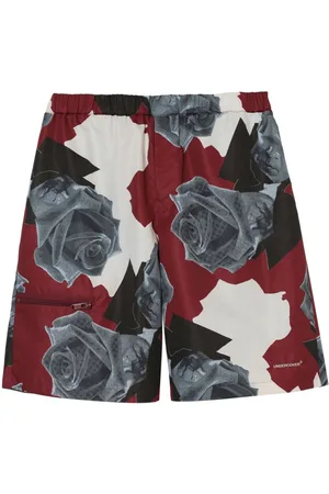 UNDERCOVER Shorts con stampa