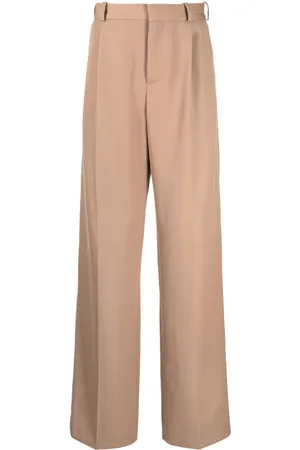 Botter Pantaloni a gamba ampia con pieghe