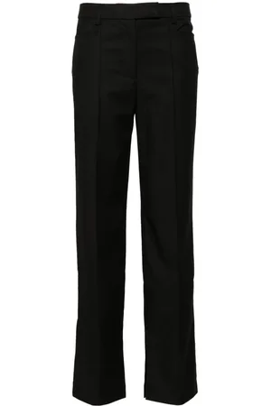 REMAIN Pantaloni slim