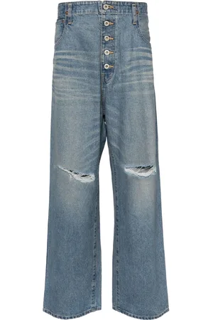 JUNYA WATANABE Jeans con strappi