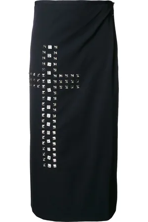 Comme des Garçons Gonna a portafoglio con borchie