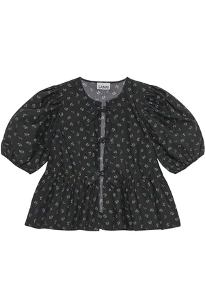 Ganni Blusa con peplum