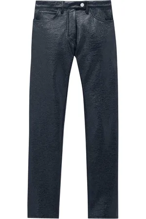 Courrèges Pantaloni slim in vinile