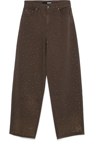 ROTATE Jeans a gamba ampia con strass