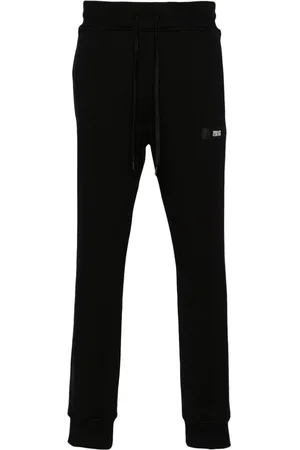 VERSACE Pantaloni sportivi con applicazione logo
