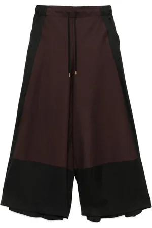 UNDERCOVER Pantaloni con inserti
