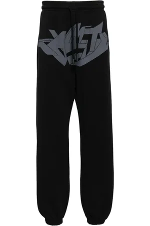 MARCELO BURLON Pantaloni con stampa grafica
