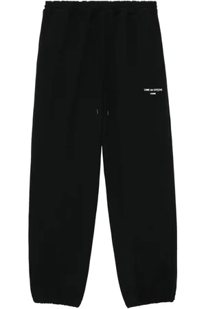 Comme des Garçons Pantaloni sportivi con stampa