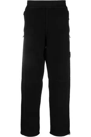 Stone Island Pantaloni con applicazione Compass