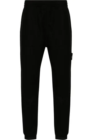 Stone Island Pantaloni sportivi con applicazione Compass