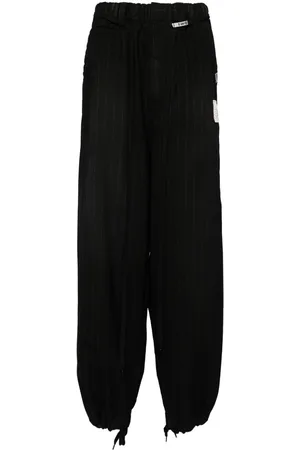Maison Mihara Yasuhiro Pantaloni gessati con coulisse