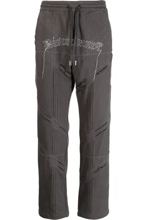 Children Of The Discordance Logo-embroidered distressed track pant