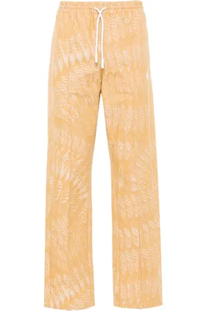 MARCELO BURLON Pantaloni dritti AOP Feather