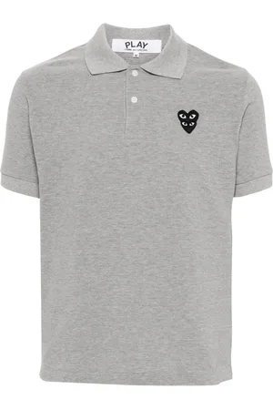 Comme des Garçons Polo con applicazione