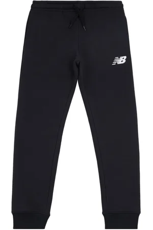New Balance Pantaloni sportivi con stampa
