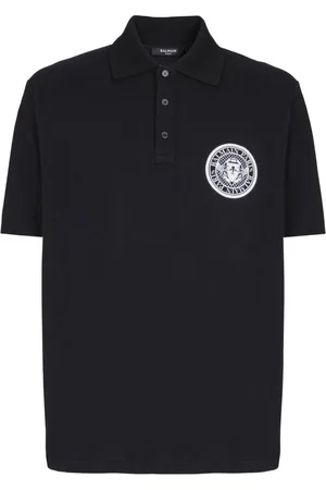 Balmain Polo in cotone con stampa Coin