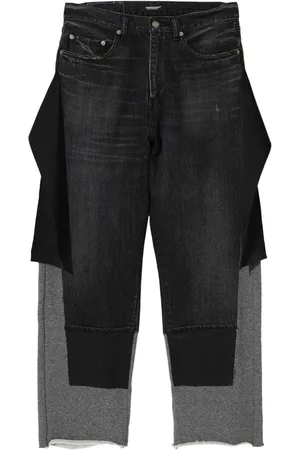 UNDERCOVER Pantaloni con design patchwork