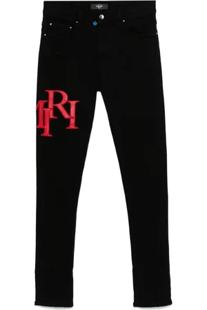 AMIRI Jeans Staggered con ricamo logo