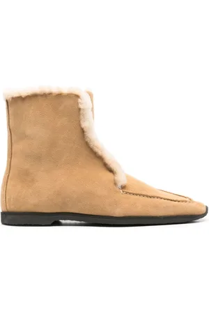Totême Stivali con bordo in shearling