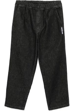 A Bathing Ape Jeans con pieghe