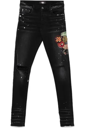AMIRI Jeans skinny con applicazione