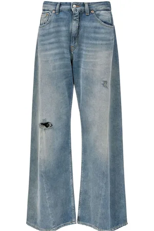 Maison Margiela Jeans a gamba ampia con effetto vissuto