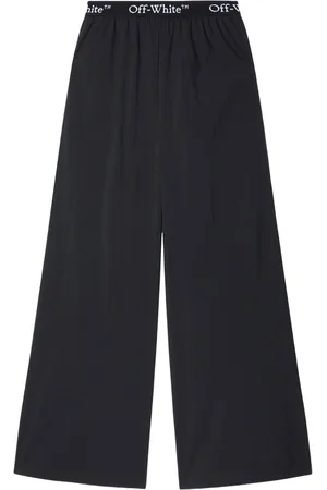 OFF-WHITE Pantaloni con banda logo