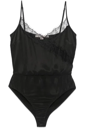 REMAIN Body con design a inserti