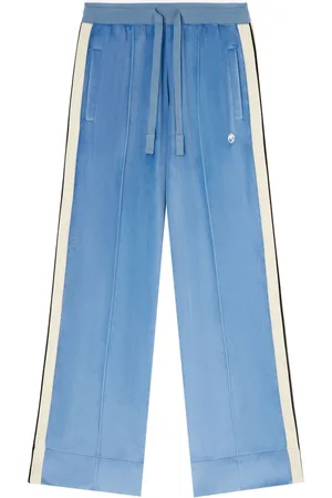 Palm Angels Pantaloni sportivi con stampa palma ovale