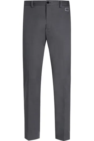 Dolce & Gabbana Pantaloni con placca logo