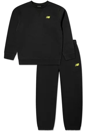 New Balance Tuta sportiva con logo