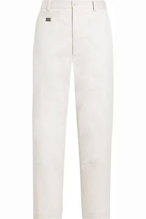 Dolce & Gabbana Pantaloni con placca logo