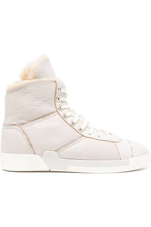 CHANEL Sneakers con shearling